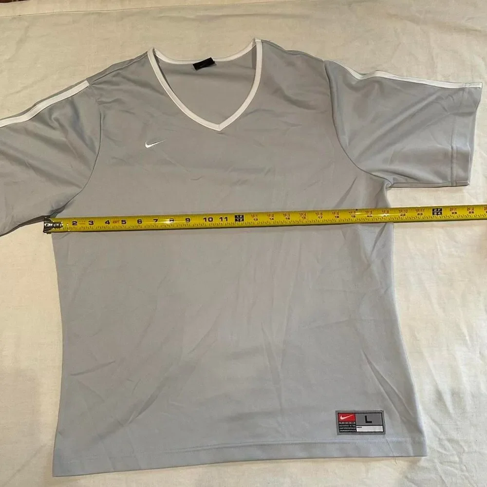 Nike Women's Grey and White T-shirt